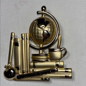 AJC Stack of Books, a Globe, an Apple, Ruler, and a Coffee Cup Gold Brooch Pin